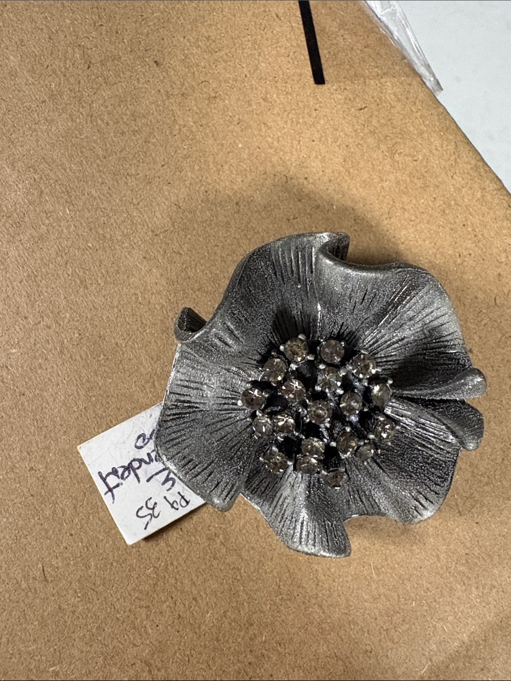 Vintage-Inspired Silver Flower Brooch with Smoky Crystal Center